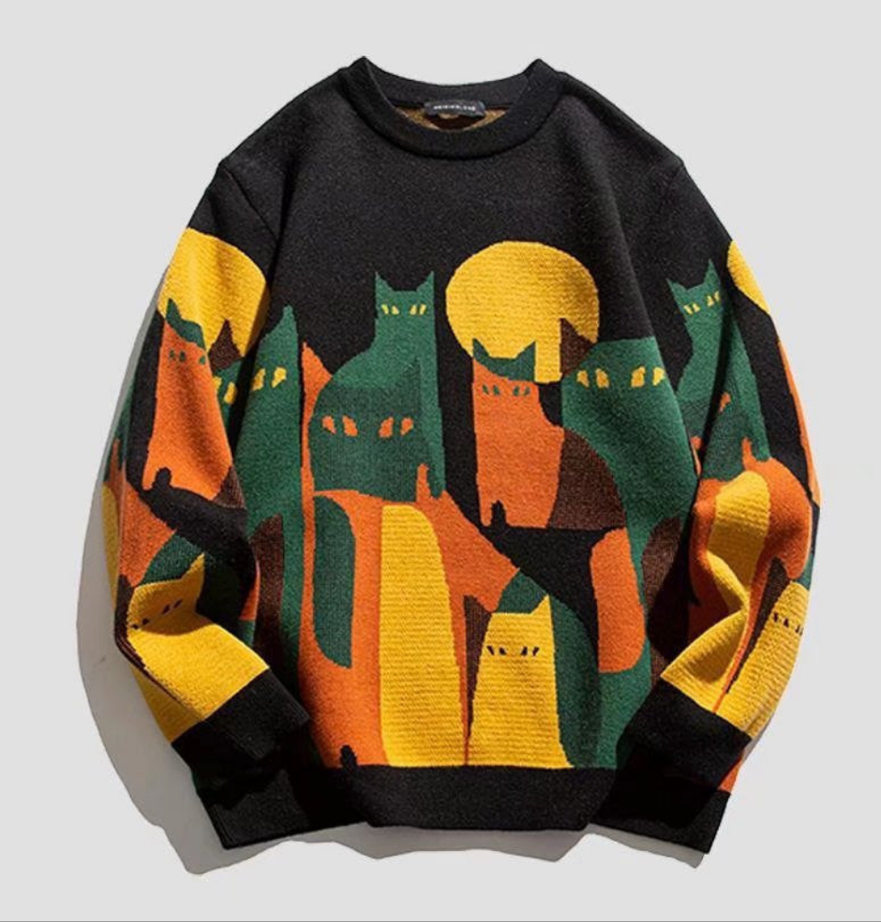 A cozy sweater featuring a playful cat design, perfect for chill vibes and snuggling up with a loved one.