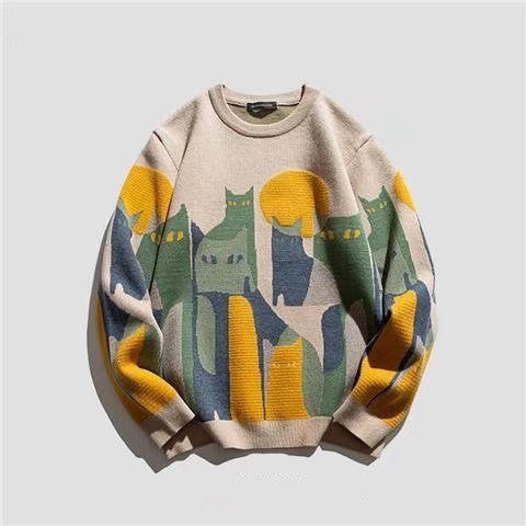 A cozy sweater featuring a playful cat design, perfect for chill vibes and snuggling up with a loved one.