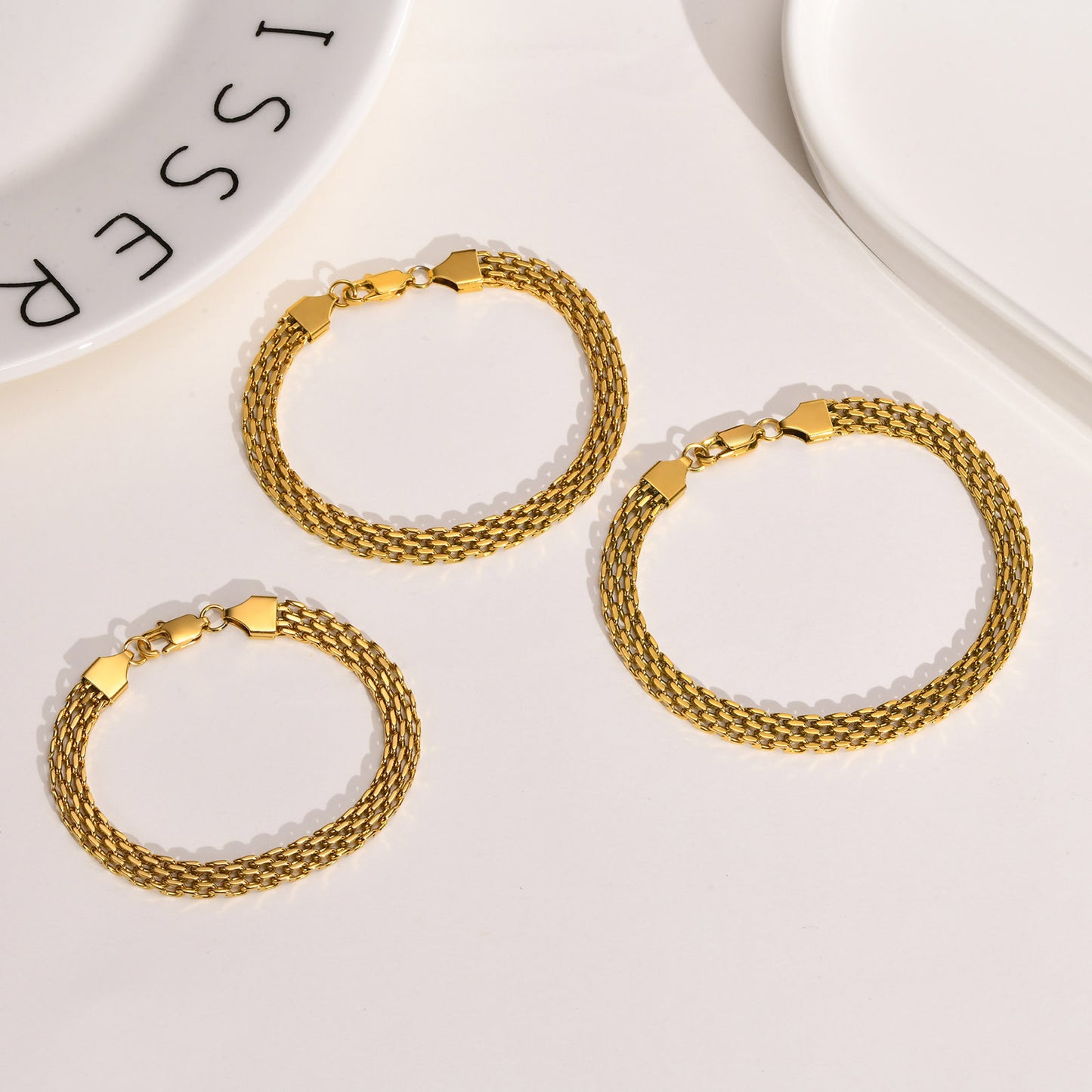 "GoldWeave: Luxe Mesh Bracelet"