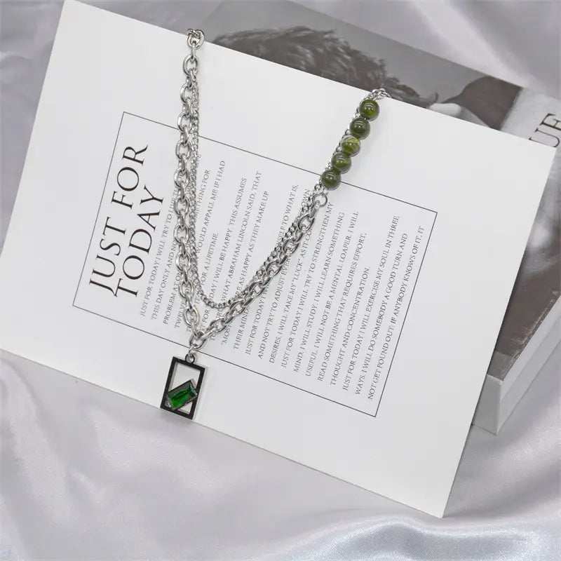 "Emerald Enigma: Titanium Steel Hip-Hop Necklace | Trendy Urban Jewelry for USA and Canada" Roljord